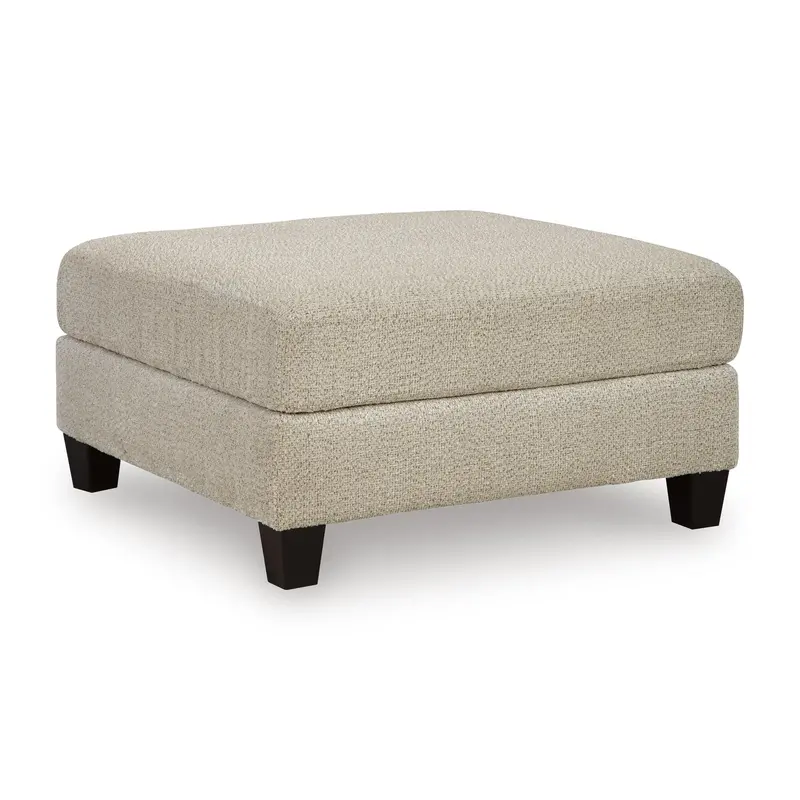 Steelwater Retreat Fabric Ottoman – Benchcraft Model 6670408 1